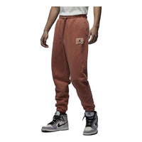 بنطال Air Jordan Essential Fleece المغسول "برتقالي" FB7299-810