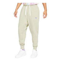 Nike Sportswear Embroidered Logo Solid Color Bundle Feet Sports Pants Beige Creamy DA0019-230