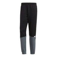 بنطال رياضي بشعار adidas originals Splicing Bundle Feet أسود GN3445