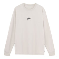 بلوفر Nike Sportswear Premium Essentials بلون سادة رياضي برقبة دائرية وأكمام طويلة أبيض DO7391-072