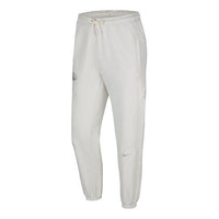 بنطال رياضي طويل برباط من Nike NBA Standard Issue باللون الأبيض العاجي CN3220-072