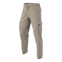 بنطلون رياضي كاجوال من Nike Sportswear Cargo بجيوب للقدمين، لون كاكي CV9301-247