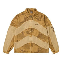 جاكيت غاز من Palace x Oakley "Sand" P24OKJK001