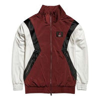 جاكيت Air Jordan FLIGHT WARM-UP بشعار بني أبيض، لون موحد "بني أبيض" AO0556-687