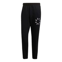بنطال رياضي فضفاض مطبوع عليه شعار adidas originals باللون الأسود H35651