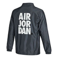 جاكيت رياضي منسوج بشعار Air Jordan مطبوع عليه أبجدية باللون الأسود CZ4825-084