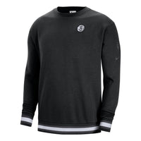 هودي رجالي من Nike Brooklyn Nets، بلون سادة، مبطن بالصوف، برقبة دائرية، وأكمام طويلة، باللون الأسود DR2280-010