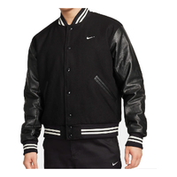 جاكيت Nike Authentics Varsity باللونين الأسود والأبيض FD7846-010
