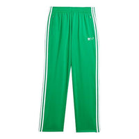 بنطال رياضي طويل كاجوال بخطوط جانبية متقاطعة من adidas originals x HUMAN MADE باللون الأخضر GV4337
